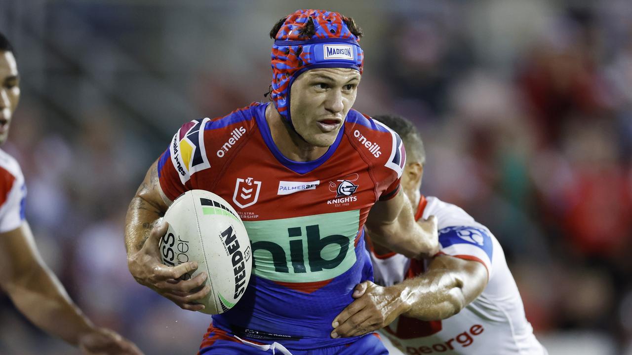 WOLLONGONG, AUSTRALIA - APRIL 17: Kalyn Ponga of the Knights is tackled during the round six NRL match between the St George Illawarra Dragons and the Newcastle Knights at WIN Stadium, on April 17, 2022, in Wollongong, Australia. (Photo by Mark Evans/Getty Images)