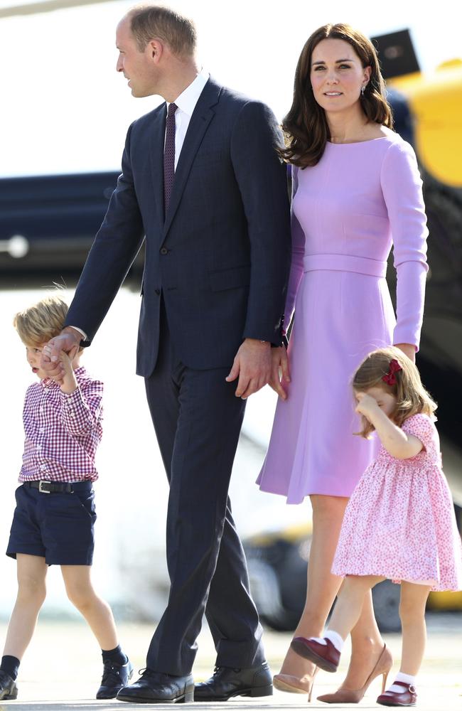 Purple reign. The Duke and Duchess of Cambridge, with their children Prince George (far left) and Princess Charlotte, in Hamburg last week. Picture: AP