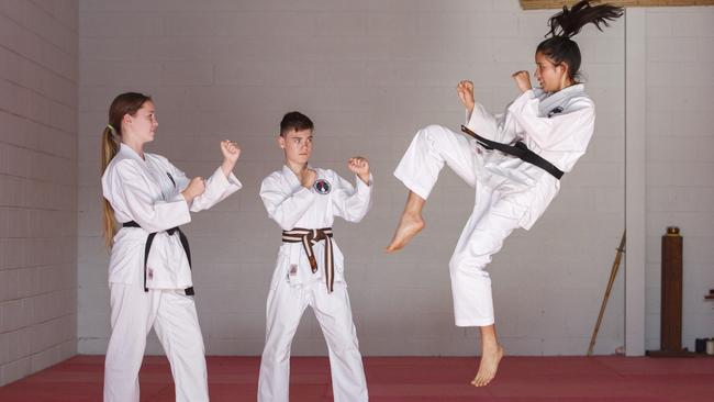 Sasha Lewis, Chase McLean and Nina Von-Huben in their Brookvale dojo.