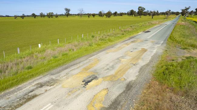 “Water is kryptonite to roads,” says Australian Road Research Board chief Michael Caltabiano, as can be seen here on the Elmore-Raywood Road. Picture: Zoe Phillips