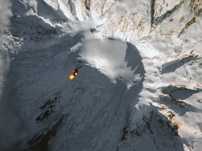 Lava is seen spilling down the side of Mawson Peak, one of Australia's only active volcanoes. Source: Copernicus Sentinel-2/Pierre Markuse