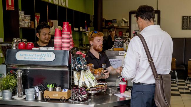 Convicted conman Peter Foster has often been spotted, even on days he is not in court, with his lawyer Chris Hannay catching up. Picture: Jerad Williams