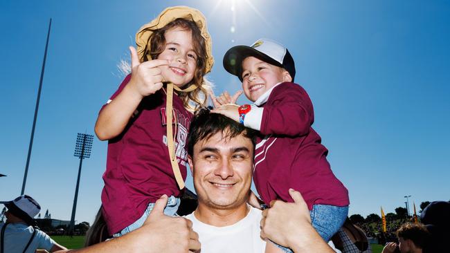 Maroons fan Remi Melia with his kids Violet 5, and Flynn 3. Picture Lachie Millard