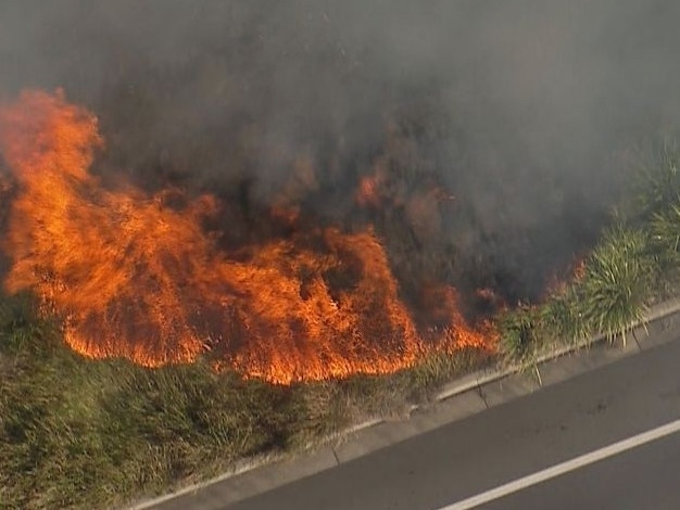 A grass fire has erupted in Sydney’s southwest,.Dozens of firefighters have been sent in to tackle the blaze along Camden Valley Way in Liverpool towards Edmonson Park. Picture: Nine News