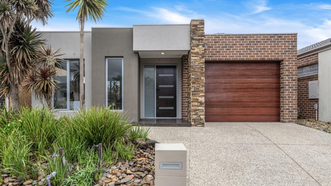 This updated Craigieburn home sold for $661,000 after a hotly contested ten-bidder auction.
