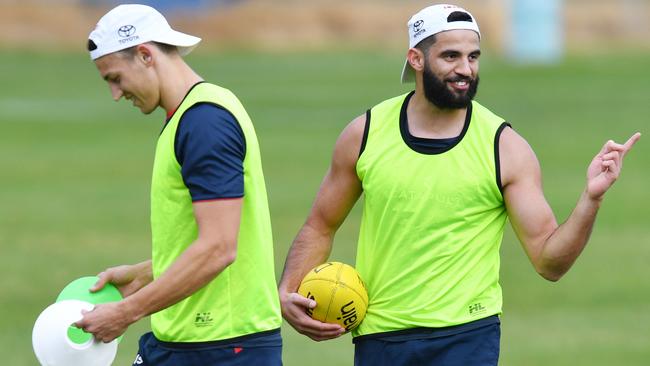 Tom Doedee and Wayne Milera at Adelaide training. Picture: AAP/David Mariuz