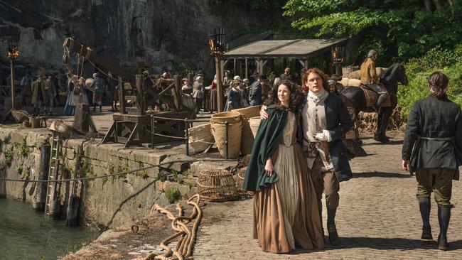 Caitriona Balfe and Sam Heughan steam up the Scottish Highlands in Outlander.