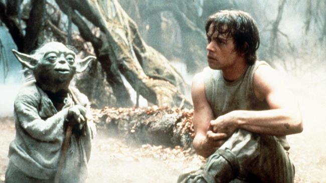 Yoda (Frank Oz) with Luke Skywalker (Mark Hamill) in this scene from Star Wars Episode V: The Empire Strikes Back.