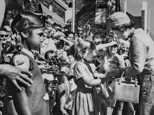 Queen Elizabeth visiting the Royal Far West childrens' home at Manly in May 1970. She received a bouquet of flowers from Christine Healey, from Balladoran. Picture: Supplied