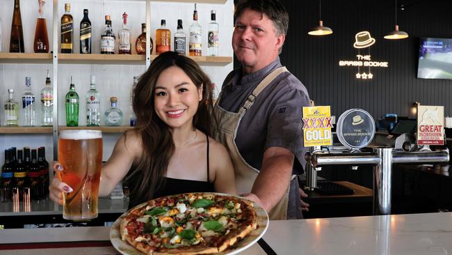 Cairns has a brand new sports bar, with the Brass Bookie opening in the old Outback Jack's building at the corner of Abbott and Aplin streets. Brass Bookie bartender Sinead Tan and head chef Shanon Burgoine are ready to pour plenty of Macalisters pints and serve gourmet pizzas at the bar's grand opening party this Saturday. Picture: Brendan Radke