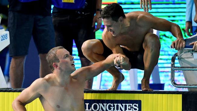 Kyle Chalmers (left) and Mitch Larkin celebrate Australia’s 4x100m medley relay win. Photo: Getty Images