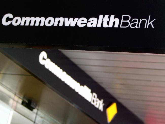 The logo of the Commonwealth Bank of Australia Ltd. (CBA) is displayed outside a bank branch in Sydney on Friday, April 8, 2011. The Australian dollar hit a new post-float high of 105.08 US cents, after the Australian March unemployment rate fell to 4.9 percent. (AAP Image/Sergio Dionisio) NO ARCHIVING