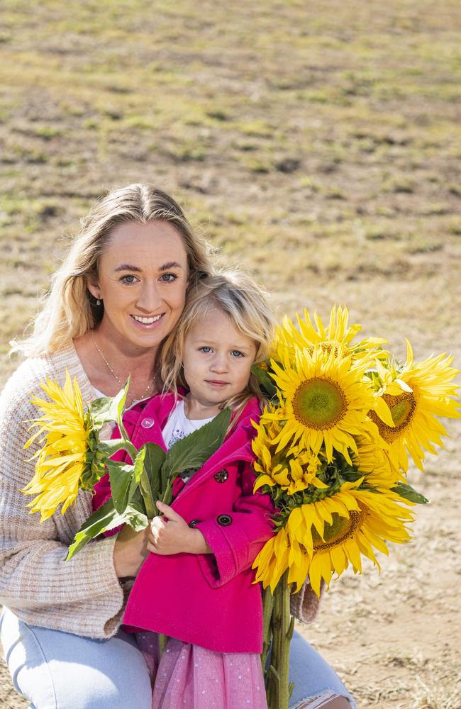 Allycia Pender with daughter Isabelle Pender at the picnic with the sunflowers event hosted by Ten Chain Farm, Saturday, June 8, 2024. Picture: Kevin Farmer