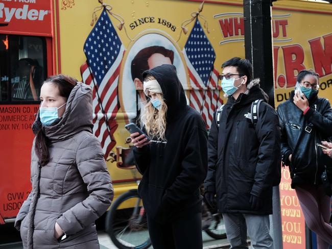 People wait in long lines in Manhattan to get tested for COVID-19 on December 22. Picture: Getty