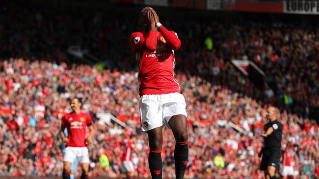 : Paul Pogba of Manchester United reacts to shooting wide of the goal during the Premier League match between Manchester United and Stoke City at Old Trafford.