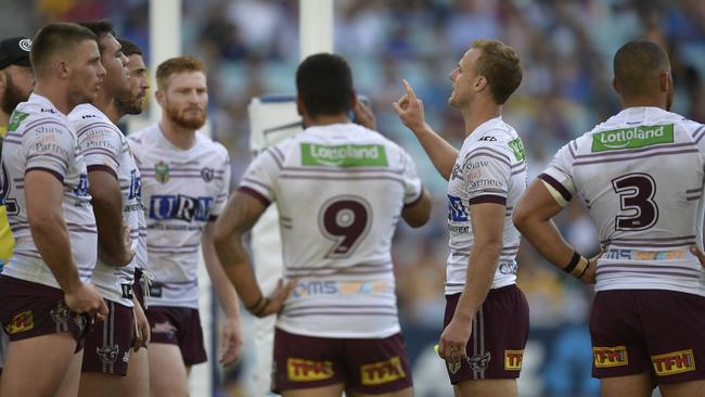 SYDNEY, AUSTRALIA — APRIL 22: Daly Cherry-Evans of Manly speaks to team mates during the round seven NRL match between the Parramatta Eels and the Manly Sea Eagles at ANZ Stadium on April 22, 2018 in Sydney, Australia. (Photo by Brett Hemmings/Getty Images)