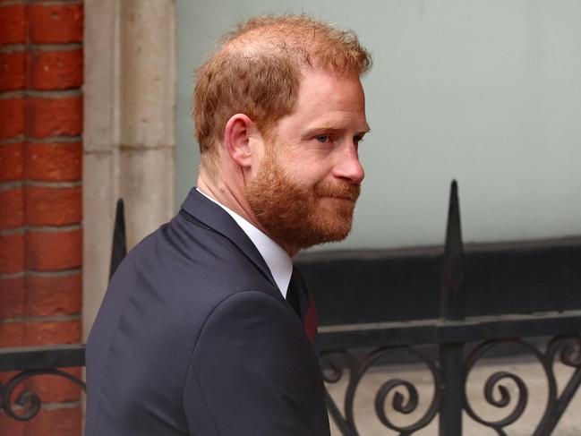 (FILES) Britain's Prince Harry, Duke of Sussex arrives at the the Royal Courts of Justice, Britain's High Court, in central London, on April 8, 2025 for the second day of his appeal hearing over the downgrading of his personal security during visits in Britain. Prince Harry Friday, may 2, lost his court bid to restore his UK police protection after the UK government downgraded his security when he stepped back from royal life and moved abroad. (Photo by HENRY NICHOLLS / AFP)