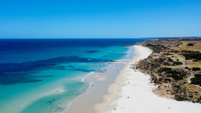 The vibrant ocean layer colours at Port Willunga beach, a South Australia tourism destination on the Fleurieu Peninsula. Picture: iStock