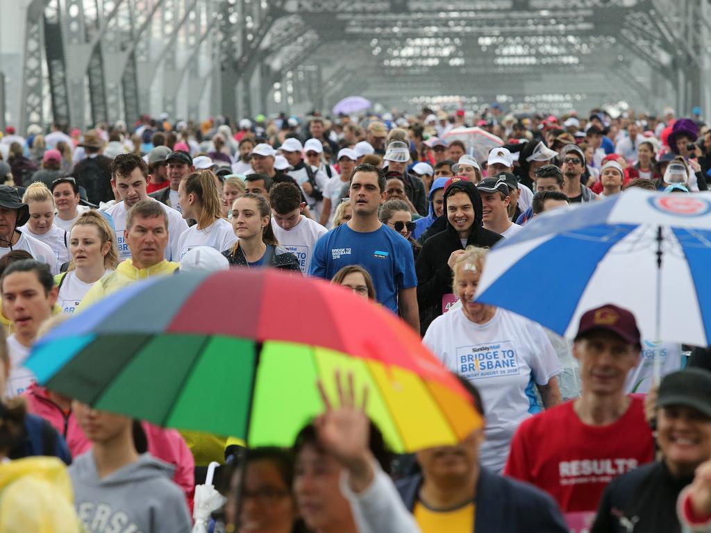 <p>Participants in the 5km course go over the Story Bridge at the Sunday Mail Bridge to Brisbane fun Run, Sunday August 26, 2018. (AAP Image/Jono Searle)</p>