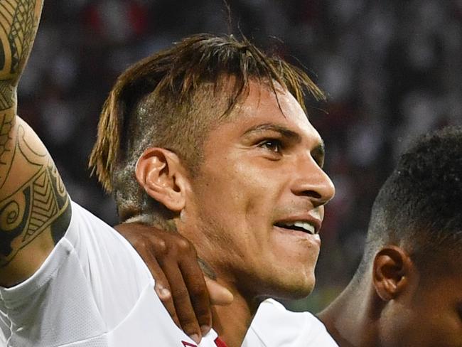 Peru's Paolo Guerrero, Pedro Aquino, Andre Carrillo and Yoshimar Yotun, from left, react after Guerrero scored during a friendly soccer match between Saudi Arabia and Peru in kybunpark stadium, St. Gallen, Switzerland,  on Sunday, June 3, 2018. (Gian Ehrenzeller/Keystone via AP)