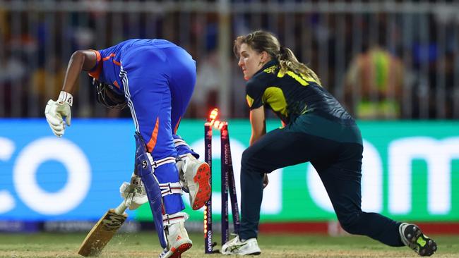 Arundhati Reddy of India is run out by Annabel Sutherland of Australia. Photo by Francois Nel/Getty Images.