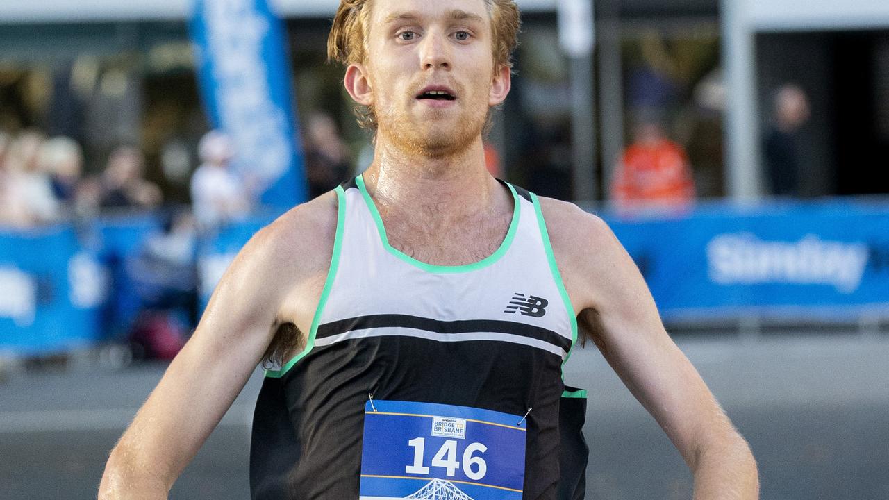 Jack Bruce crosses the finish line at the Bridge to Brisbane 2019 at South Bank, Sunday, August 25, 2019 (AAP Image/Richard Walker)