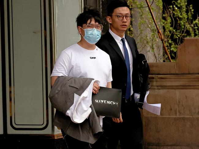 Jialun Wang (left, white shirt) at Downing Centre Local Court. Picture: NCA NewsWire / Dylan Coker