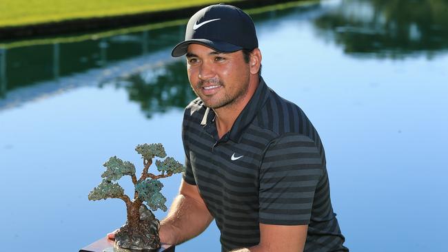 SAN DIEGO, CA - JANUARY 29:  Jason Day of Australia poses with the trophy after the sixth playoff on the 18th hole to win the Farmers Insurance Open at Torrey Pines South  on January 29, 2018 in San Diego, California.  (Photo by Sean M. Haffey/Getty Images)