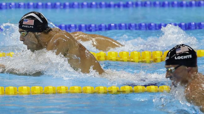 Which one is which? A CBC commentator has had a hard time differentiating between US swim stars Michael Phelps and Ryan Lochte. Picture: AP