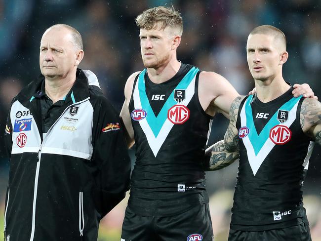 Port coach Ken Hinkley stands with his captain Tom Jonas and deputy Hamish Hartlett. Picture: Sarah Reed
