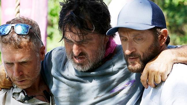 Ross Clarke-Jones is carried by medics on the set of Survivor Australia after injuring himself during a challenge. Picture: Network 10