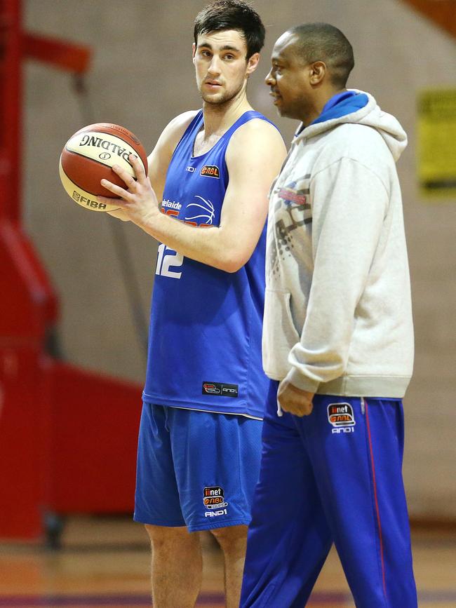 Sam Johns with coach Joey Wright at Adelaide 36ers training in 2014. Picture: Sarah Reed.