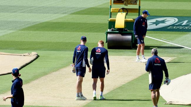 English players inspect the MCG wicket before last year’s Boxing Day Test. Picture: Nicole Garmston