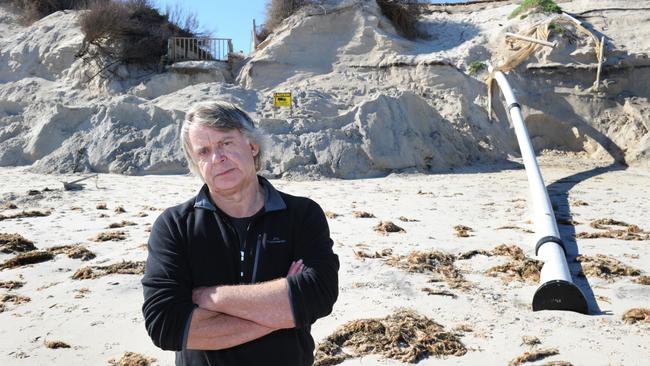 Coastal ecologist Ian Dyson at West Beach in front of Adelaide Shores caravan Park showing the storm damage caused in the winter of 2016.