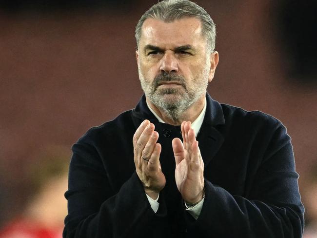 Tottenham Hotspur's Greek-Australian Head Coach Ange Postecoglou applauds the fans following the English Premier League football match between Southampton and Tottenham Hotspur at St Mary's Stadium in Southampton, southern England on December 15, 2024. (Photo by JUSTIN TALLIS / AFP) / RESTRICTED TO EDITORIAL USE. No use with unauthorized audio, video, data, fixture lists, club/league logos or 'live' services. Online in-match use limited to 120 images. An additional 40 images may be used in extra time. No video emulation. Social media in-match use limited to 120 images. An additional 40 images may be used in extra time. No use in betting publications, games or single club/league/player publications. /