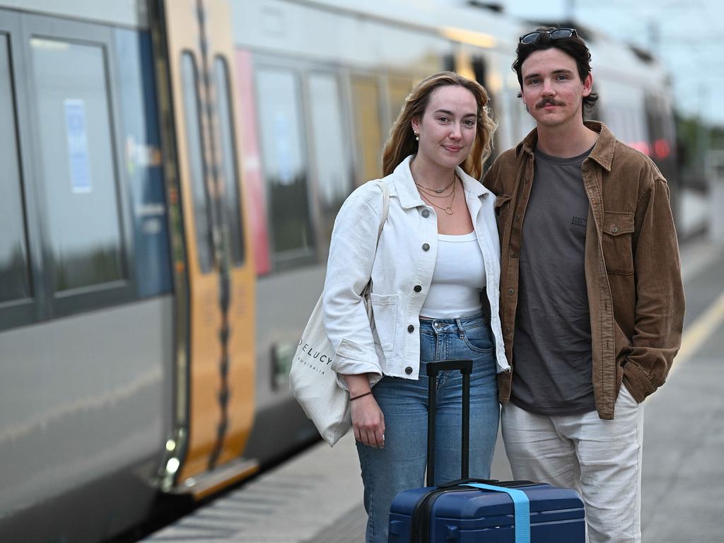 Brisbane locals Maddie Butterfield and Kyle McDermott return from a weekend away in Melbourne on Sunday. Picture: Lyndon Mechielsen