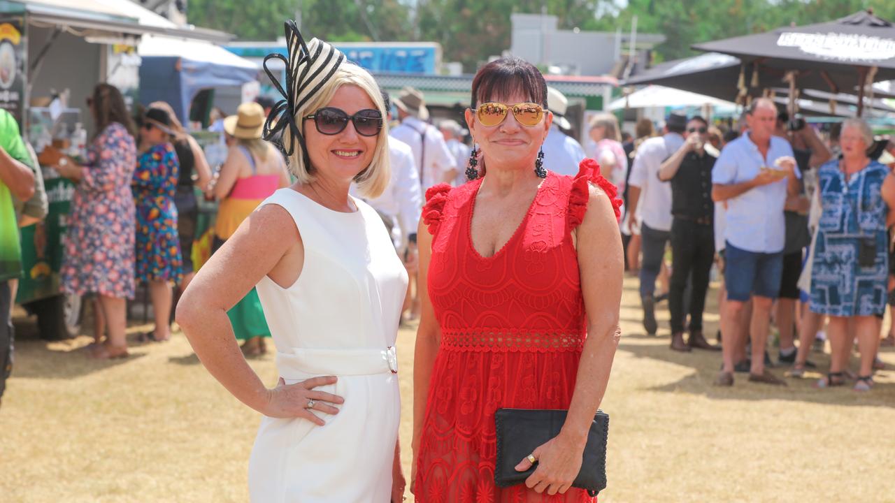 Having a ball at The Great Northern Darwin Cup at Fannie Bay Turf Club are Samantha Surr and Jenny Munro. Picture: Glenn Campbell