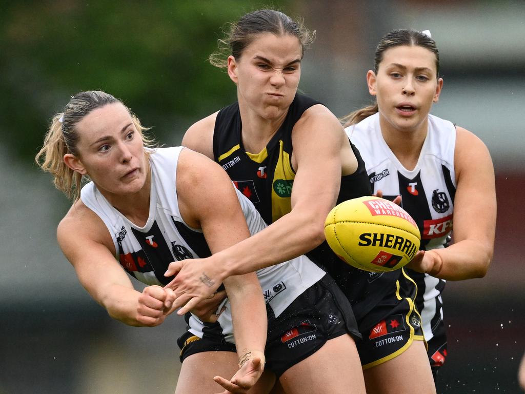 Ellie McKenzie tackles Charlotte Taylor. Picture: Quinn Rooney/Getty Images