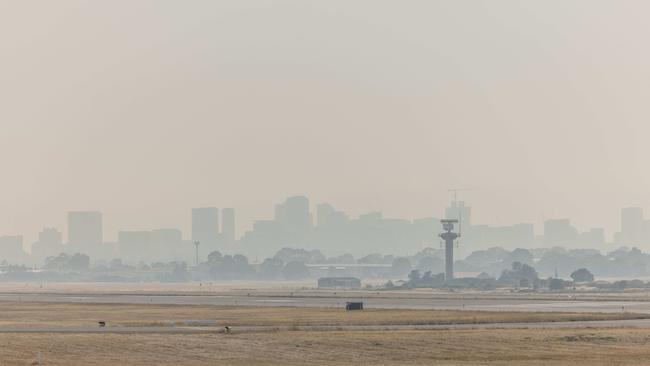 Smoke from Victoria passes over Adelaide CBD on Sunday. Picture: Ben Clark