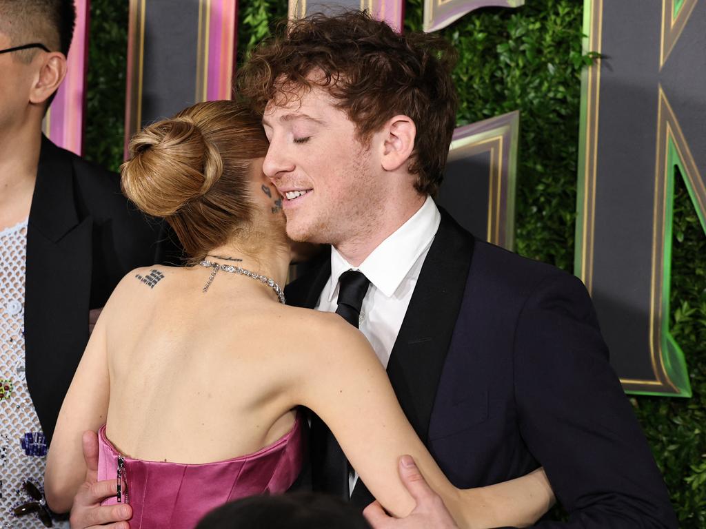 Grande and boyfriend Ethan Slater, who also stars in ‘Wicked’, go in for a hug on the red carpet. Picture: Theo Wargo/Getty Images/AFP