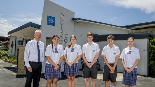 Aquinas College has won the best medium school on the Gold Coast. Principal Peter Hurley, Irana Lolesio, 16, Ava Henry, 17, Ted Leeson, 17, Max Mason, 16, Isabella Gonzalez, 16. Picture: Jerad Williams