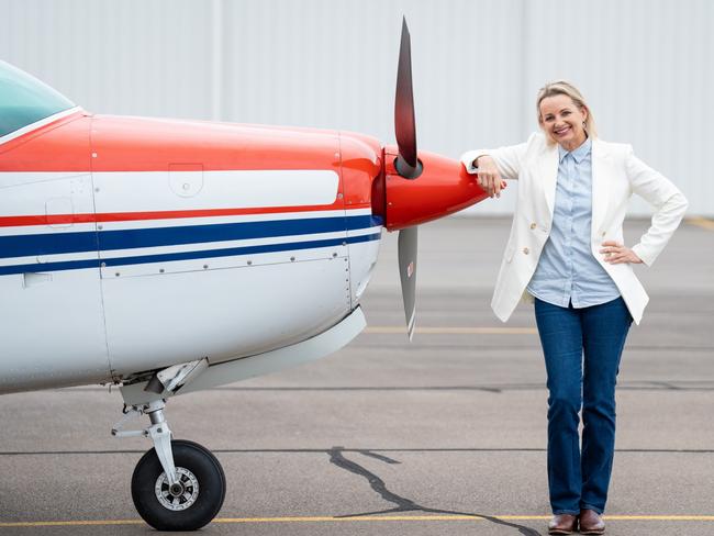 MP Sussan Ley with the first plane she flew, at Albury. Picture: Simon Dallinger