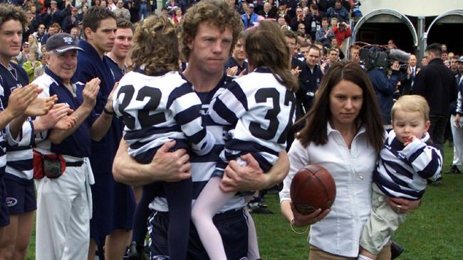 Family man ... Garry Hocking with wife Melina and children Chelsea, Tayla and Lochlan in his final game for Geelong, against Brisbane at Kardinia Park in 2001. Picture: Michael Dodge