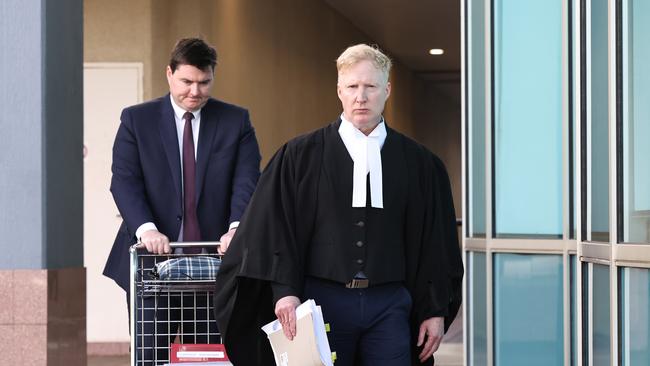 Prosecutors David Jenkins and Michael Lehane leaves the Cairns Supreme Court after the sentencing of Trevor James Thomsen, who pleaded guilty to the manslaughter if gus two year old nephew Chase Thomsen in September 2021. Picture: Brendan Radke