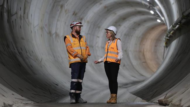 Victoria’s Minister for Transport Infrastructure, Jacinta Allan and worker Ryan Martin in the Metro tunnel. Picture: NCA NewsWire / David Crosling