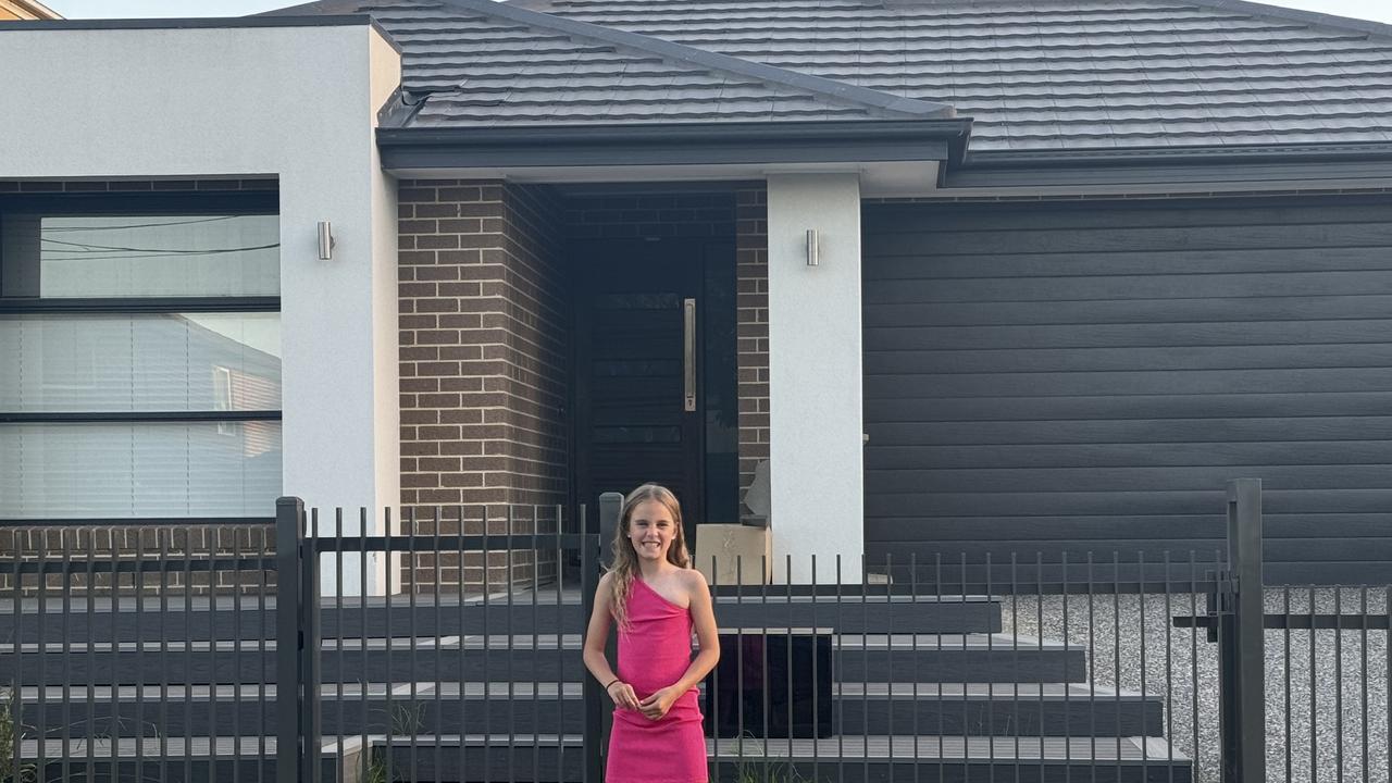 Ruby McLellan outside the house she co-owns in outer Melbourne.