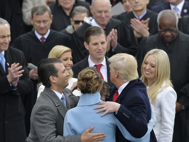 President Donald Trump hugs his family after taking the oath of office during the 58th Presidential Inauguration at the U.S. Capitol in Washington on January 20, 2017. Picture: AP