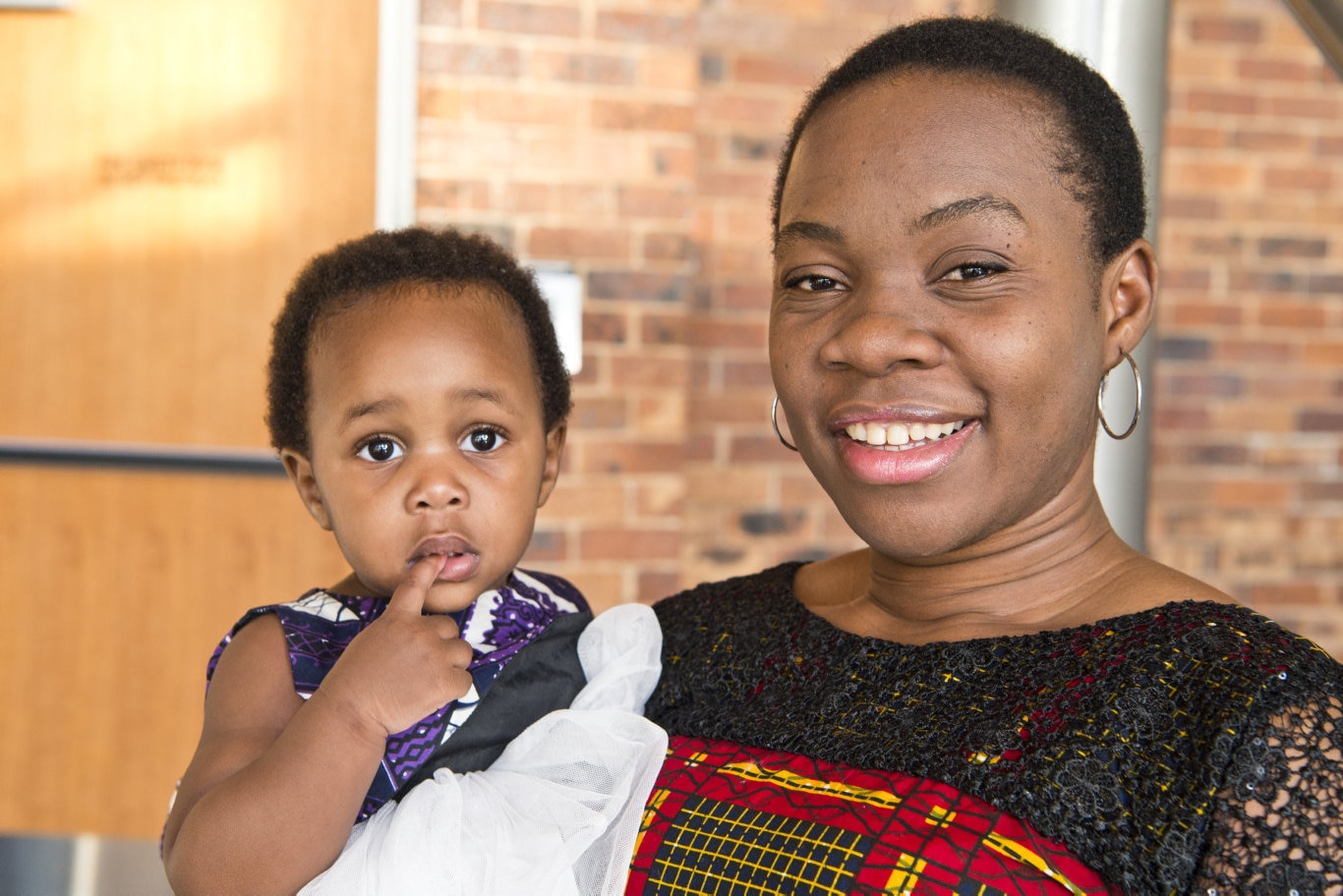 New citizen Precious Eleda with daughter Georgia Eleda at the Toowoomba Regional Council Australian Citizenship Ceremony at The Annex, Friday, October 18, 2019. Picture: Kevin Farmer