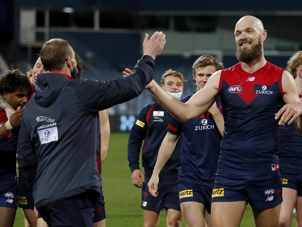 The Demons celebrate after winning the 2021 minor premiership. Picture: Dylan Burns/AFL Photos via Getty Images