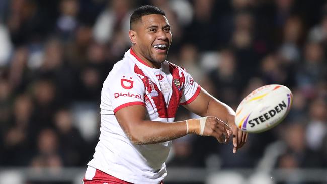 Moeaki Fotuaika of Tonga celebrates their sides second try during Rugby League World Cup 2021 Pool D match between Tonga and Papua New Guinea at Totally Wicked Stadium on October 18, 2022 in St Helens, England. (Photo by Charlotte Tattersall/Getty Images for RLWC)